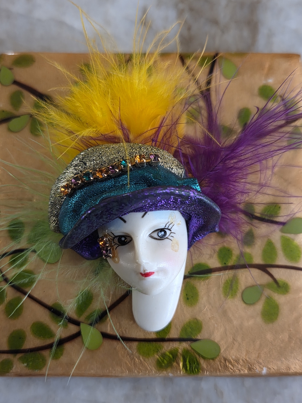Mardi Gras Colorful Feathered Face Brooch — Purple, Green, Yellow Accents